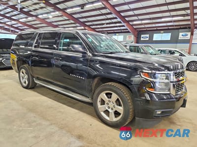 Czwarte zdjęcie samochodu z boku: 2015 CHEVROLET SUBURBAN K1500 LT VIN:1GNSKJKC8FR547643 - miniatura