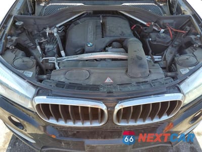Zdjęcie 12 z 13 samochodu: 2014 BMW X5 SDRIVE35I VIN:5UXKR2C57E0H33933 - miniatura