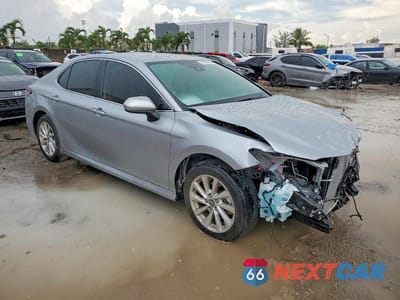 Czwarte zdjęcie samochodu z boku: 2024 TOYOTA CAMRY LE VIN:4T1C11AKXRU880481 - miniatura