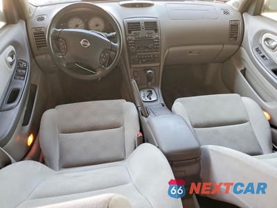 Zdjęcie 8 z 12 samochodu: 2002 NISSAN MAXIMA SE VIN:JN1DA31A42T001065 - miniatura