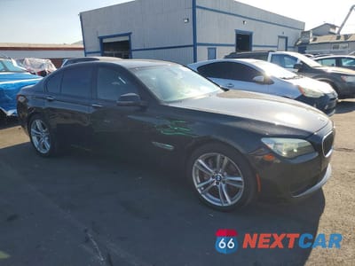 Czwarte zdjęcie samochodu z boku: 2015 BMW 740 I VIN:WBAYA6C50FGK16616 - miniatura