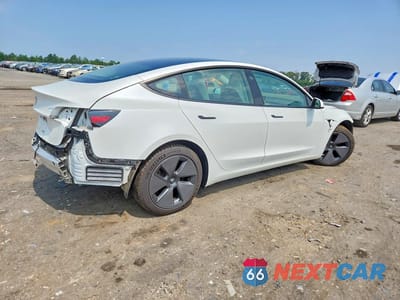 Trzecie zdjęcie samochodu z tyłu: 2021 TESLA MODEL 3 VIN:5YJ3E1EAXMF851817 - miniatura