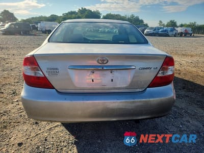 Zdjęcie 6 z 12 samochodu: 2003 TOYOTA CAMRY LE VIN:4T1BE30K03U750276 - miniatura