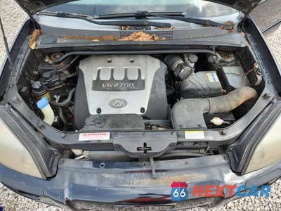Zdjęcie 12 z 13 samochodu: 2006 HYUNDAI TUCSON GLS VIN:KM8JN12D06U325482 - miniatura