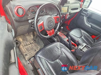 Zdjęcie 8 z 13 samochodu: 2014 JEEP WRANGLER UNLIMITED SAHARA VIN:1C4BJWEG0EL128355 - miniatura
