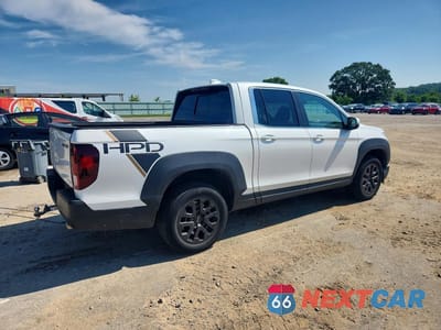Trzecie zdjęcie samochodu z tyłu: 2023 HONDA RIDGELINE RTL VIN:5FPYK3F5XPB029042 - miniatura