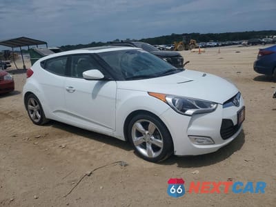 Czwarte zdjęcie samochodu z boku: 2014 HYUNDAI VELOSTER BASE VIN:KMHTC6AD6EU191914 - miniatura