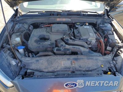 Zdjęcie 11 z 12 samochodu: 2015 FORD FUSION TITANIUM PHEV VIN:3FA6P0SU0FR147455 - miniatura