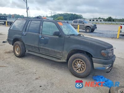 Czwarte zdjęcie samochodu z boku: 1999 FORD EXPLORER VIN:1FMZU32X4XZA50697 - miniatura