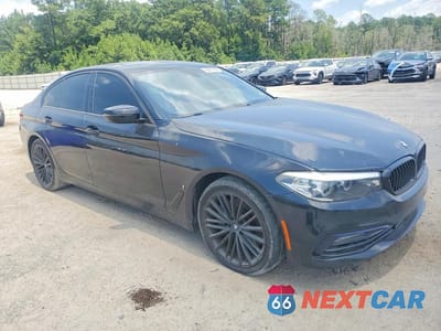 Czwarte zdjęcie samochodu z boku: 2018 BMW 530E VIN:WBAJA9C53JB034370 - miniatura