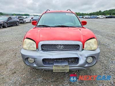 Piąte zdjęcie samochodu w środku: 2003 HYUNDAI SANTA FE GLS VIN:KM8SC13D03U549372 - miniatura