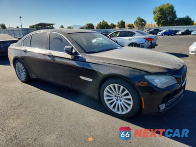 Czwarte zdjęcie samochodu z boku: 2012 BMW 750 I VIN:WBAKA8C50CCY37827 - miniatura