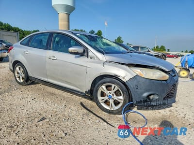 Czwarte zdjęcie samochodu z boku: 2013 FORD FOCUS SE VIN:1FADP3F2XDL244367 - miniatura