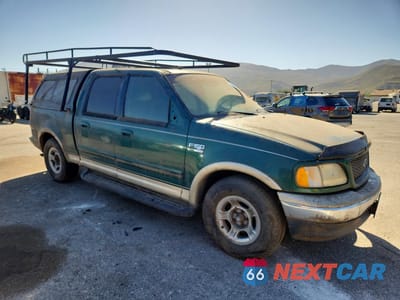 Czwarte zdjęcie samochodu z boku: 2001 FORD F150 SUPERCREW VIN:1FTRW07L31KD68166 - miniatura