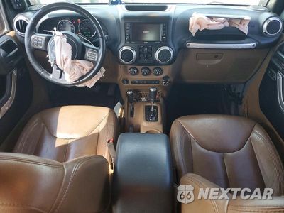 Zdjęcie 8 z 12 samochodu: 2015 JEEP WRANGLER UNLIMITED SAHARA VIN:1C4BJWEG1FL555769 - miniatura