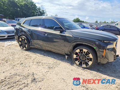 Czwarte zdjęcie samochodu z boku: 2023 BMW XM VIN:5YM23CS03P9R79038 - miniatura