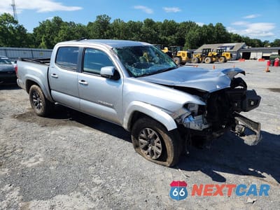 Czwarte zdjęcie samochodu z boku: 2023 TOYOTA TACOMA SR5 V6 VIN:3TMCZ5AN3PM609990 - miniatura