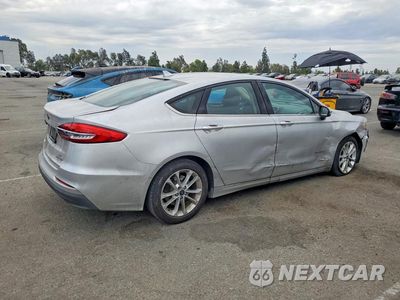 Trzecie zdjęcie samochodu z tyłu: 2019 FORD FUSION SE VIN:3FA6P0LU4KR119568 - miniatura