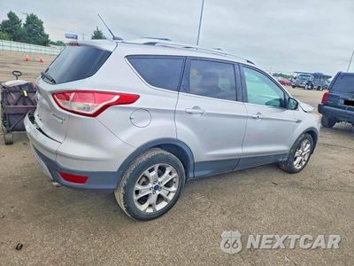 Trzecie zdjęcie samochodu z tyłu: 2014 FORD ESCAPE TITANIUM VIN:1FMCU0JX4EUC98366 - miniatura