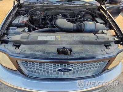 Zdjęcie 11 z 12 samochodu: 2001 FORD F-150 VIN:1FTRX18L11NB08865 - miniatura