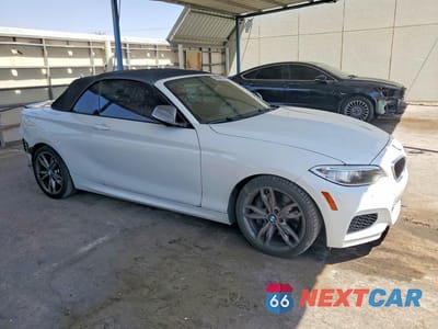 Czwarte zdjęcie samochodu z boku: 2015 BMW M235I VIN:WBA1M1C50FV393383 - miniatura