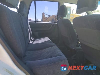 Zdjęcie 11 z 13 samochodu: 1999 HONDA CR-V LX VIN:JHLRD1840XC030524 - miniatura