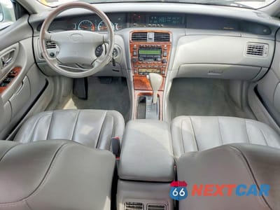 Zdjęcie 8 z 12 samochodu: 2001 TOYOTA AVALON XLS VIN:4T1BF28B91U175071 - miniatura