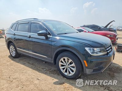 Czwarte zdjęcie samochodu z boku: 2018 VOLKSWAGEN TIGUAN SE VIN:3VV2B7AX9JM165987 - miniatura