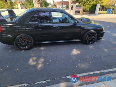 Zdjęcie 11 z 13 samochodu: 2004 SUBARU IMPREZA WRX STI VIN:JF1GD70694L521776 - miniatura