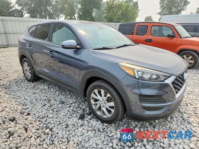 Czwarte zdjęcie samochodu z boku: 2019 HYUNDAI TUCSON SE VIN:KM8J2CA46KU840194 - miniatura