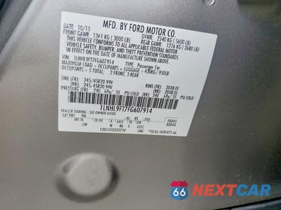 Zdjęcie 12 z 12 samochodu: 2015 LINCOLN MKS VIN:1LNHL9FT7FG607914 - miniatura