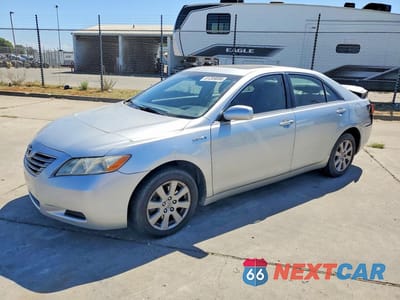 2007 TOYOTA CAMRY HYBRID JTNBB46KX73010672 - główne zdjęcie licytacji z USA - miniatura