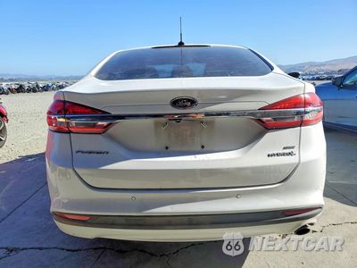 Zdjęcie 6 z 12 samochodu: 2018 FORD FUSION SE HYBRID VIN:3FA6P0LU6JR117559 - miniatura
