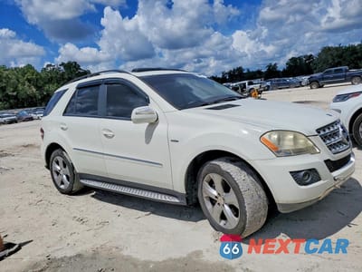 Czwarte zdjęcie samochodu z boku: 2009 MERCEDES-BENZ ML VIN:4JGBB25E09A471703 - miniatura