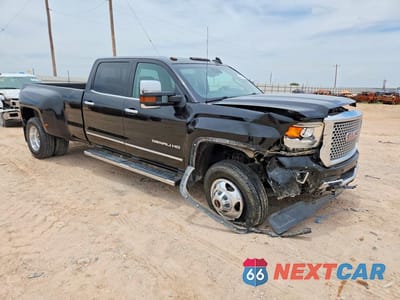 Czwarte zdjęcie samochodu z boku: 2016 GMC SIERRA K3500 DENALI VIN:1GT42YE89GF128771 - miniatura