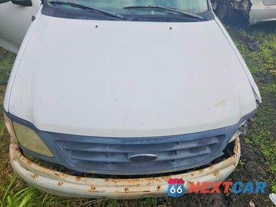 Zdjęcie 11 z 12 samochodu: 2000 FORD F150 VIN:1FTZX1727YKB02038 - miniatura