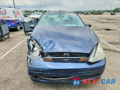 Piąte zdjęcie samochodu w środku: 2003 FORD FOCUS LX VIN:1FAFP33PX3W267816 - miniatura