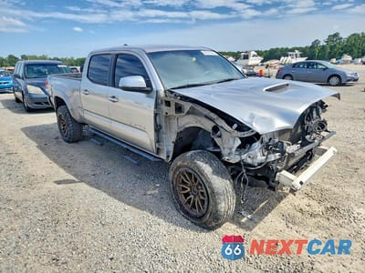 Czwarte zdjęcie samochodu z boku: 2017 TOYOTA TACOMA TRD SPORT VIN:3TMBZ5DN7HM007313 - miniatura