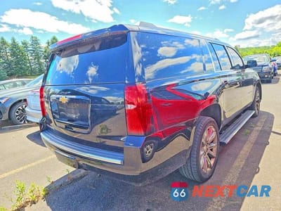 Czwarte zdjęcie samochodu z boku: 2015 CHEVROLET SUBURBAN K1500 LTZ VIN:1GNSKKKC8FR722852 - miniatura