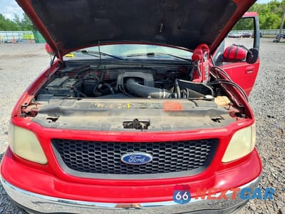 Zdjęcie 11 z 12 samochodu: 2001 FORD F150 SUPERCREW VIN:1FTRW08L91KC32624 - miniatura