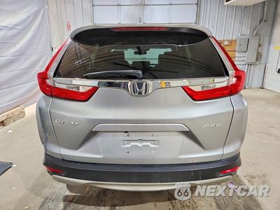 Zdjęcie 6 z 13 samochodu: 2017 HONDA CR-V EXL VIN:2HKRW2H81HH620088 - miniatura