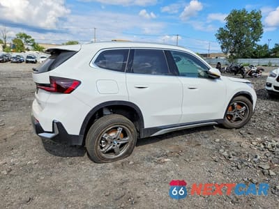 Trzecie zdjęcie samochodu z tyłu: 2026 BMW X1 XDRIVE28I VIN:WBX73EF07T5549893 - miniatura