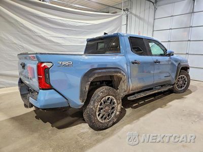 Trzecie zdjęcie samochodu z tyłu: 2026 TOYOTA TACOMA TRD OFF-ROAD VIN:3TMLB5JN3TM222810 - miniatura