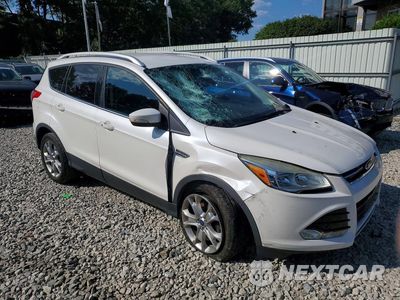 Czwarte zdjęcie samochodu z boku: 2014 FORD ESCAPE TITANIUM VIN:1FMCU0JXXEUE00107 - miniatura