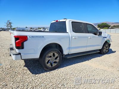 Trzecie zdjęcie samochodu z tyłu: 2024 FORD F150 LIGHTNING XLT VIN:1FT6W3L73RWG26851 - miniatura
