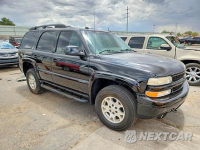 Czwarte zdjęcie samochodu z boku: 2004 CHEVROLET TAHOE K1500 VIN:1GNEK13Z54R200672 - miniatura