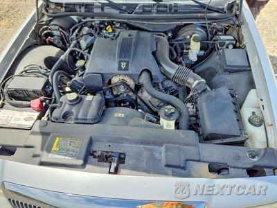 Zdjęcie 11 z 12 samochodu: 2003 MERCURY GRAND MARQUIS GS VIN:2MEFM74W33X649947 - miniatura