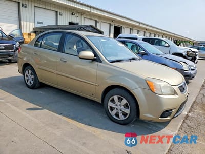 Czwarte zdjęcie samochodu z boku: 2011 KIA RIO LX VIN:KNADH4A39B6734143 - miniatura
