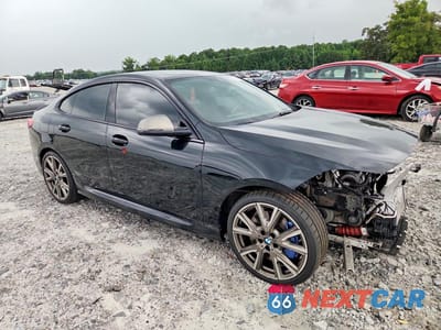 Czwarte zdjęcie samochodu z boku: 2023 BMW M235XI VIN:WBA13AL08P7L82077 - miniatura