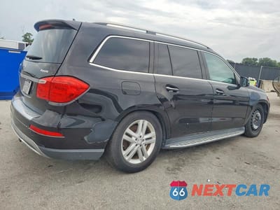 Trzecie zdjęcie samochodu z tyłu: 2015 MERCEDES-BENZ GL 450 4MATIC VIN:4JGDF6EE3FA495400 - miniatura